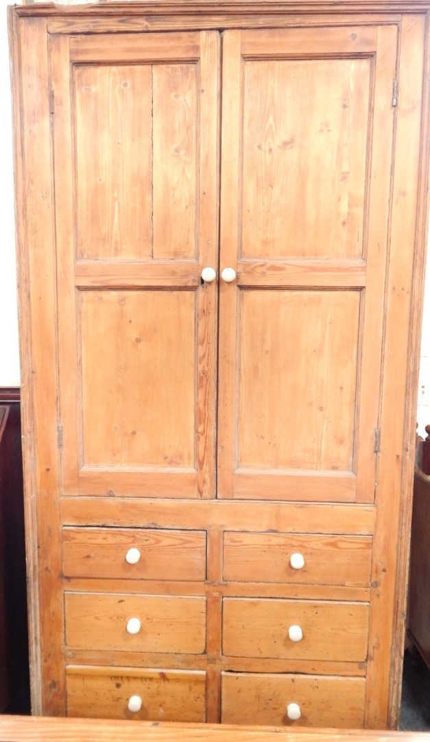 Appraisal: A Victorian pine kitchen larder comprising twin panelled door top