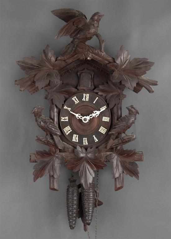 Appraisal: German Black Forest carved wood cuckoo clock early th century