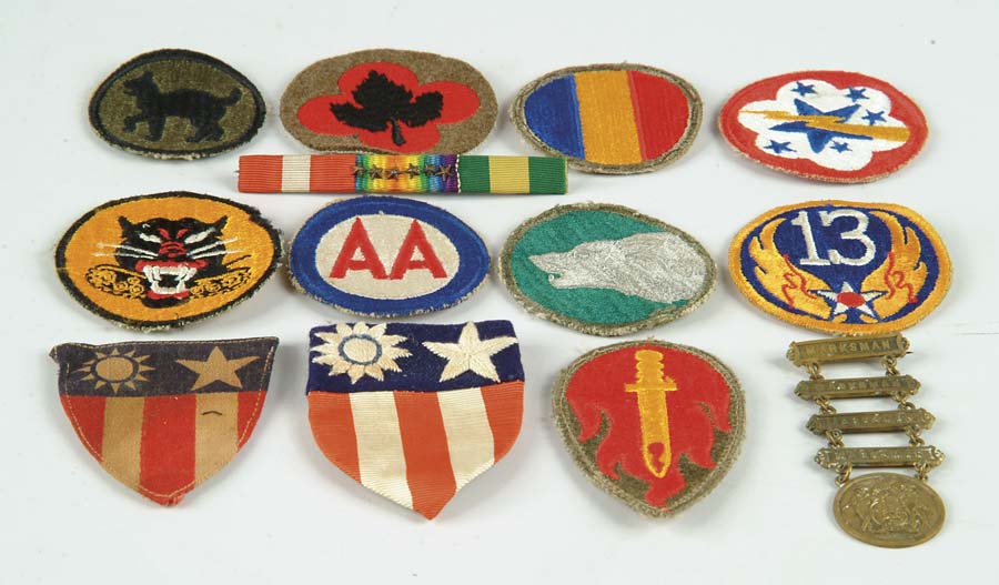 Appraisal: BOX LOT OF WWII INSIGNIA PATCHES Lot includes some buttons