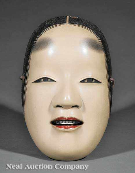 Appraisal: A Japanese Carved and Painted Wood Female Noh Mask modeled