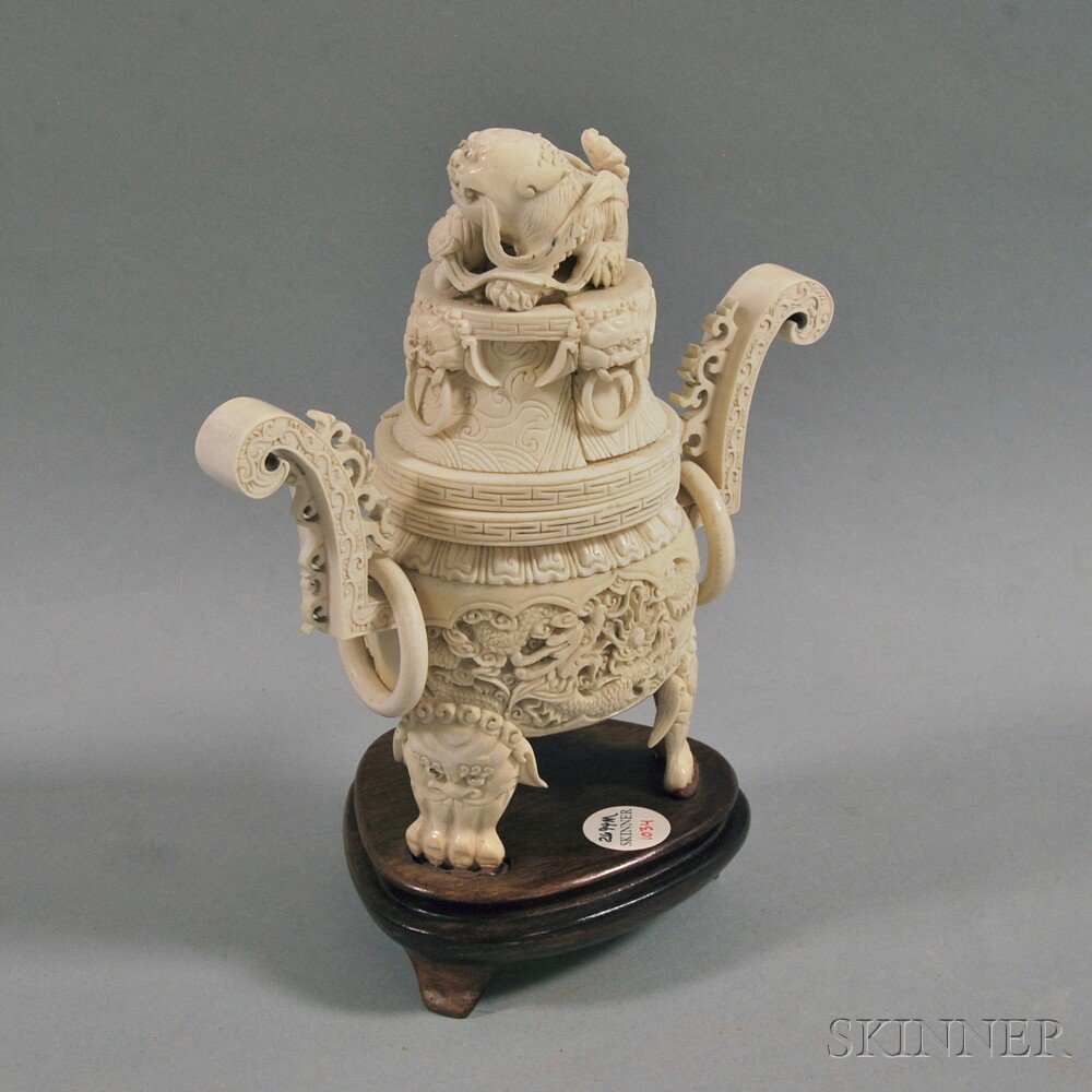 Appraisal: Carved Bone Covered Ding with Wood Stand China th century