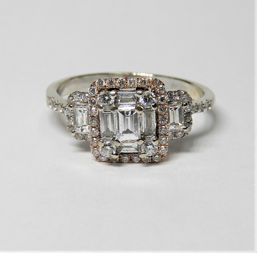 Appraisal: K WHITE ROSE GOLD DIAMOND ENGAGEMENT RING th CenturySparking baguette