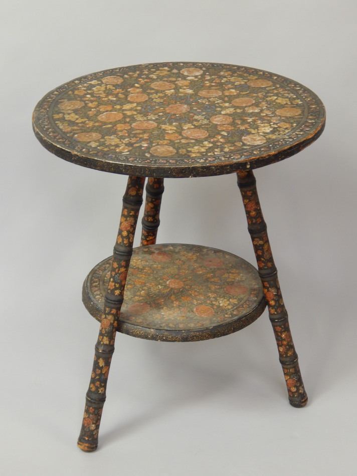 Appraisal: A thC Indian gilt and lacquered occasional table with undershelf