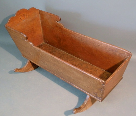 Appraisal: Pennsylvania pine cradle early th c with cheese cutter rockers