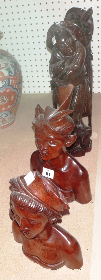 Appraisal: A pair of Oriental hardwood carved figures of immortals with