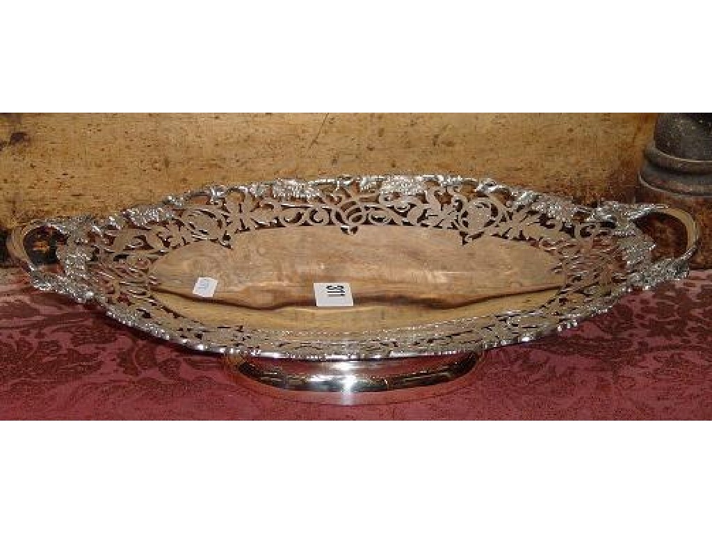 Appraisal: A silver open dish of oval form on pedestal foot