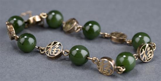 Appraisal: KT yellow gold jade bracelet Bracelet contains jade balls mm