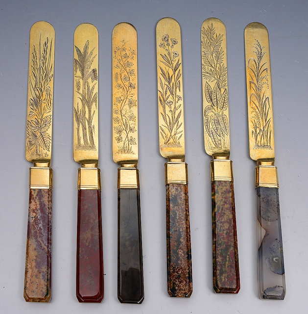 Appraisal: A SET OF SIX CONTINENTAL GILT METAL DESSERT KNIVES with