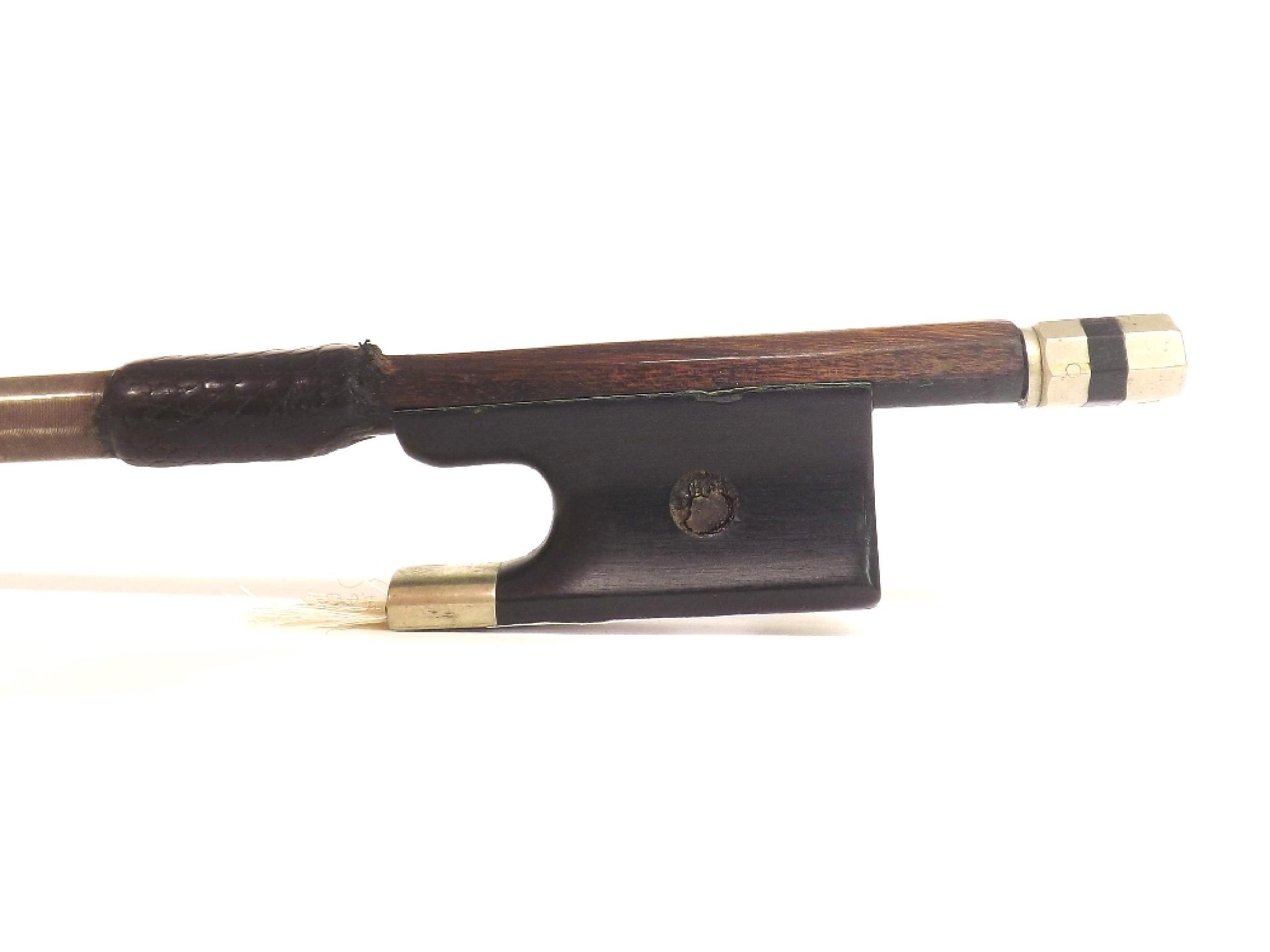 Appraisal: French nickel mounted violin bow by and stamped C Bazin