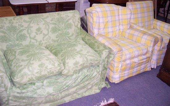 Appraisal: A two seater sofa on turned tapering supports an upholstered