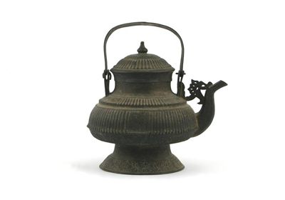 Appraisal: A South East Asian brass Kiri or kettle and cover