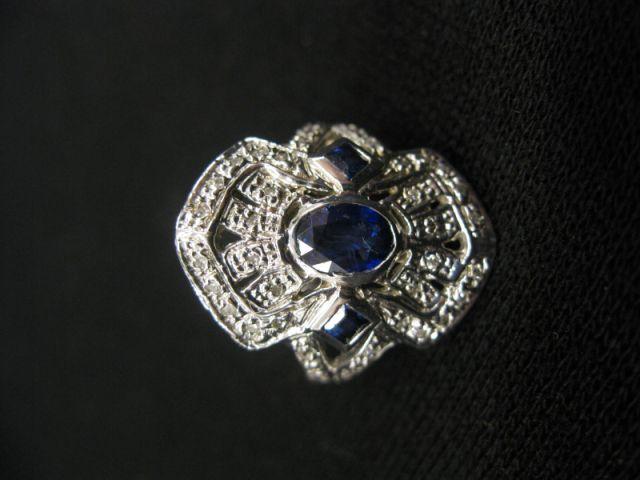 Appraisal: Sapphire Diamond Ring center oval gem with sapphires diamonds throughout