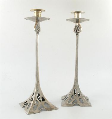 Appraisal: A pair of modern electroplated candlesticks unmarked in the Art