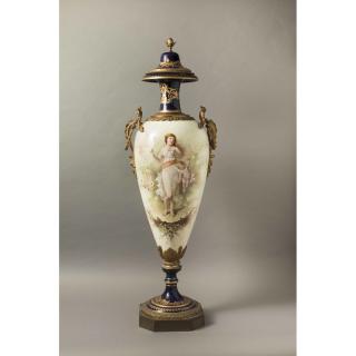 Appraisal: Sevres Style Covered Porcelain Urn Sevres style bronze mounted porcelain