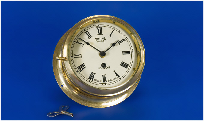 Appraisal: Brass Marine Clock By Smiths Enfield Dial is inches in