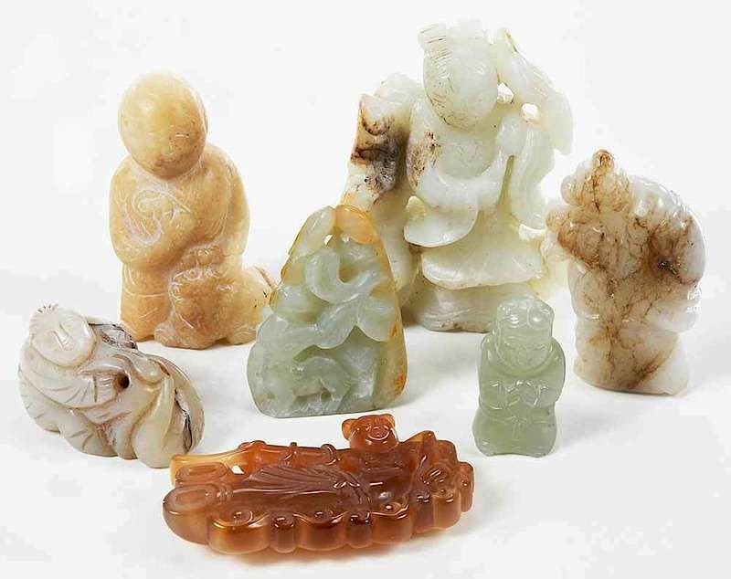 Appraisal: Seven Jade Hardstone Carved Figures Chinese figure with bixie yellow