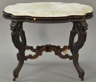 Appraisal: Victorian walnut marble top center table with shaped marble top