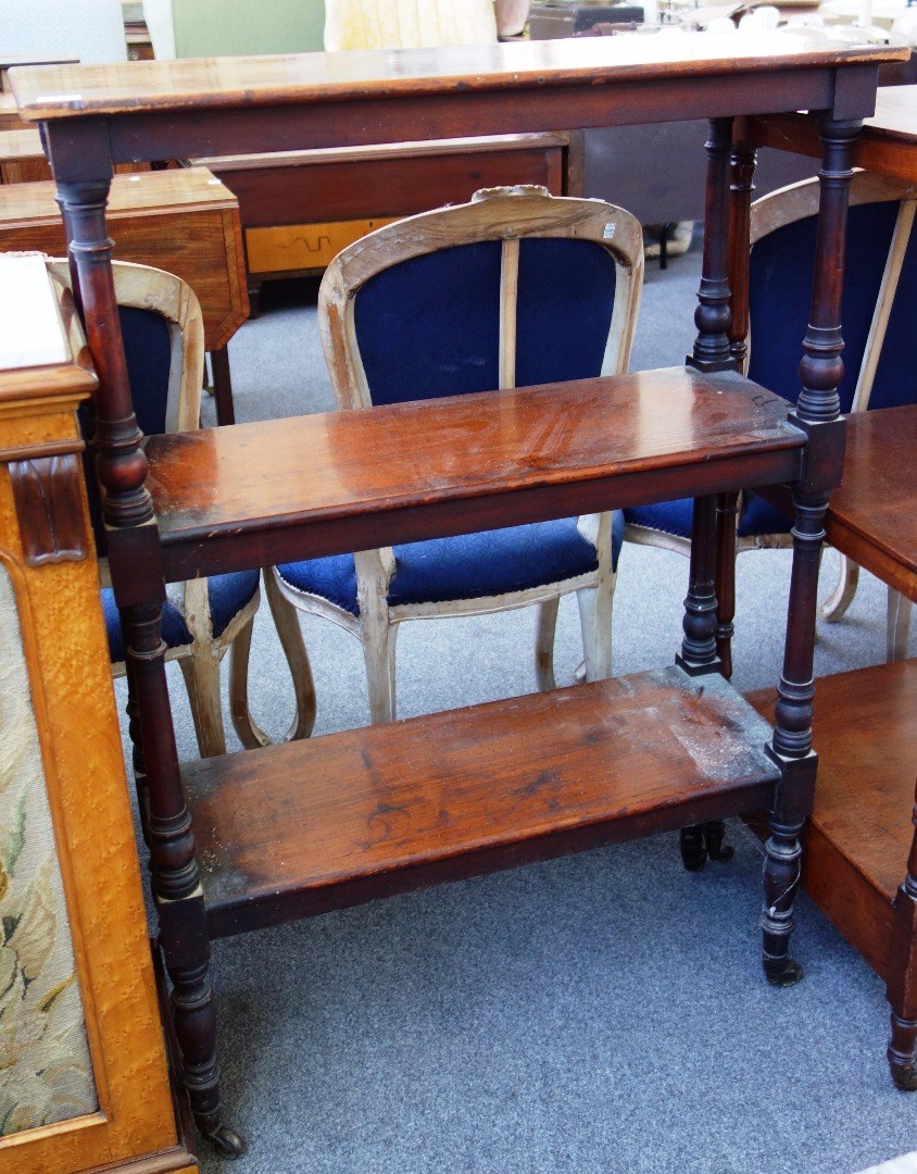 Appraisal: A th century mahogany rectangular three tier whatnot on turned