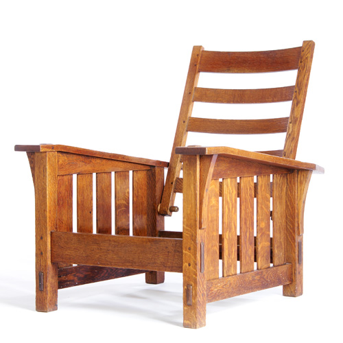 Appraisal: GUSTAV STICKLEY Drop-arm Morris chair with five slats under each