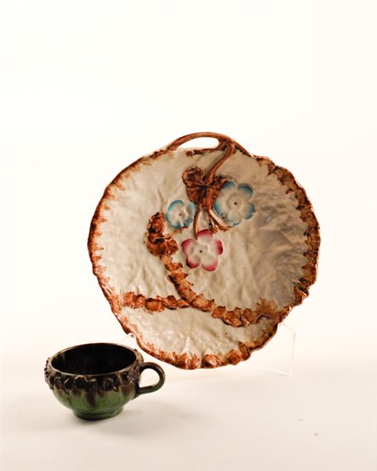 Appraisal: An Early Majolica Cake Plate and Teacup the plate in