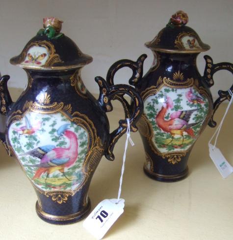 Appraisal: A pair of Sampson lidded vases in the style of