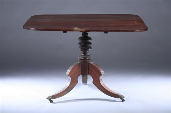 Appraisal: LATE GEORGIAN WALNUT TILT-TOP TEA TABLE th century Top with