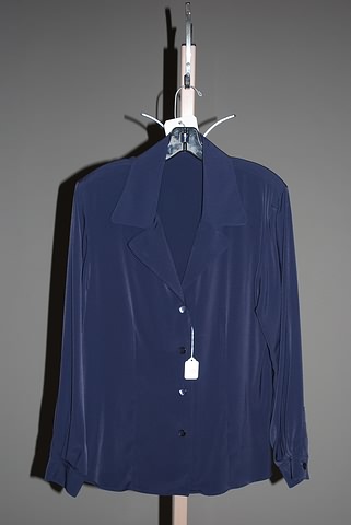 Appraisal: Jaeger long sleeve polyester blouse navy with button front flap