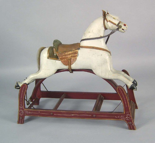 Appraisal: Carved and painted rocking horse th c h w