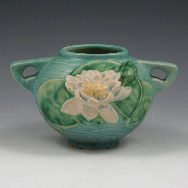 Appraisal: Roseville Water Lily handled rose bowl in blue Marked Roseville