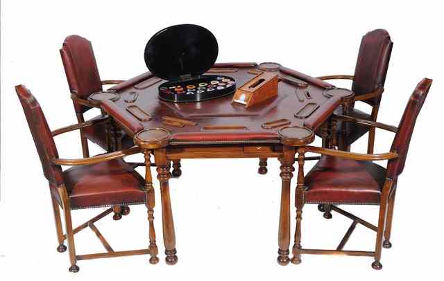 Appraisal: A MAHOGANY HEXAGONAL GAMING TABLE the lid lifting off to