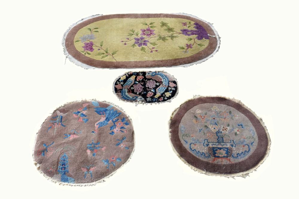 Appraisal: FOUR CHINESE MATSComprising an oval floral rug with a yellow