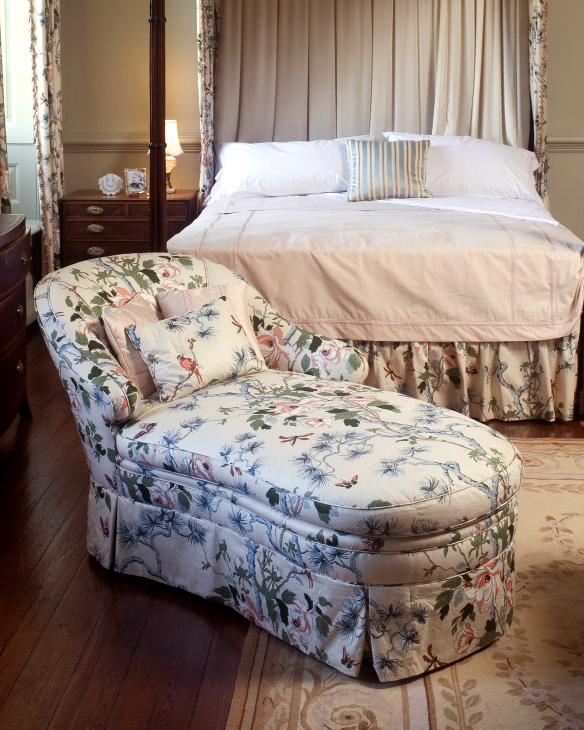 Appraisal: CHAISE LOUNGE WITH FLORAL AND BIRD CHINTZ UPHOLSTERY