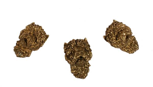 Appraisal: A group of three gilt bronze figural dog head door