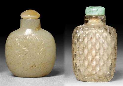 Appraisal: TWO SNUFF BOTTLES China th century a Light green jade