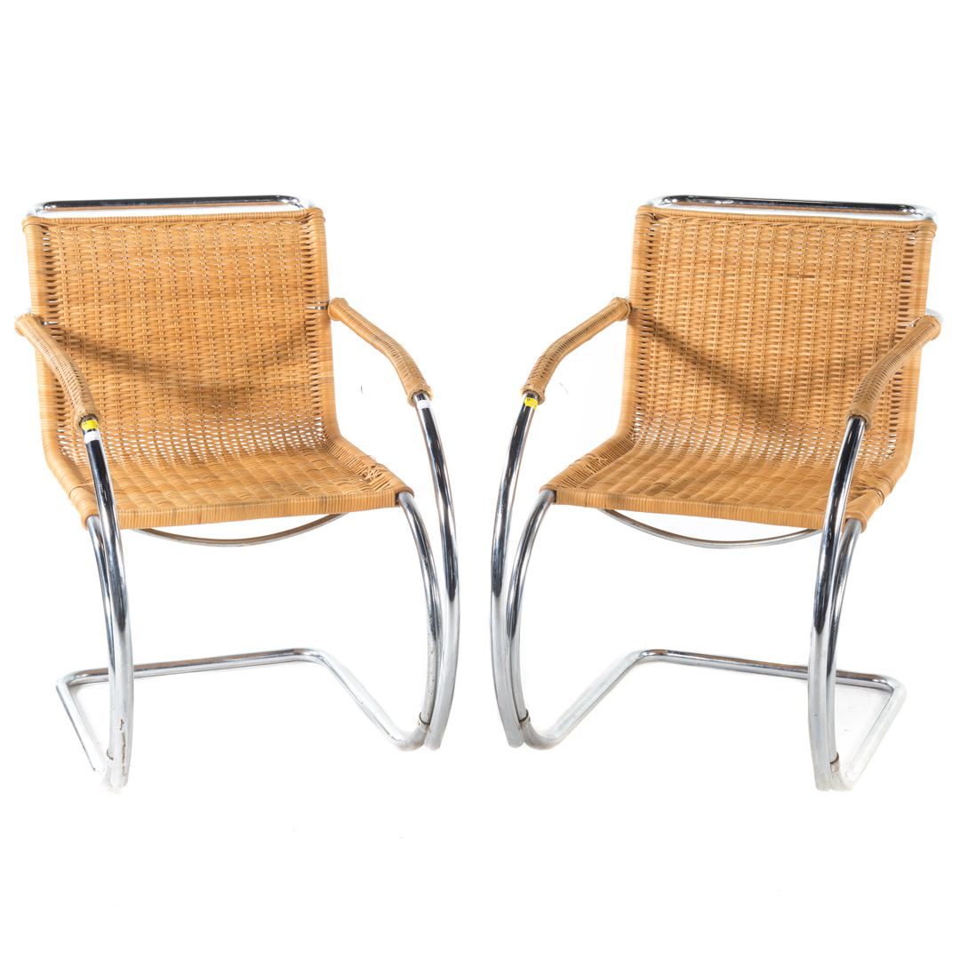 Appraisal: Pair of contemporary chrome and wicker armchairs in H Condition