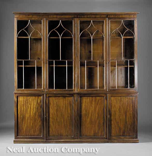 Appraisal: A George III-Style Mahogany Bookcase th c the upper case