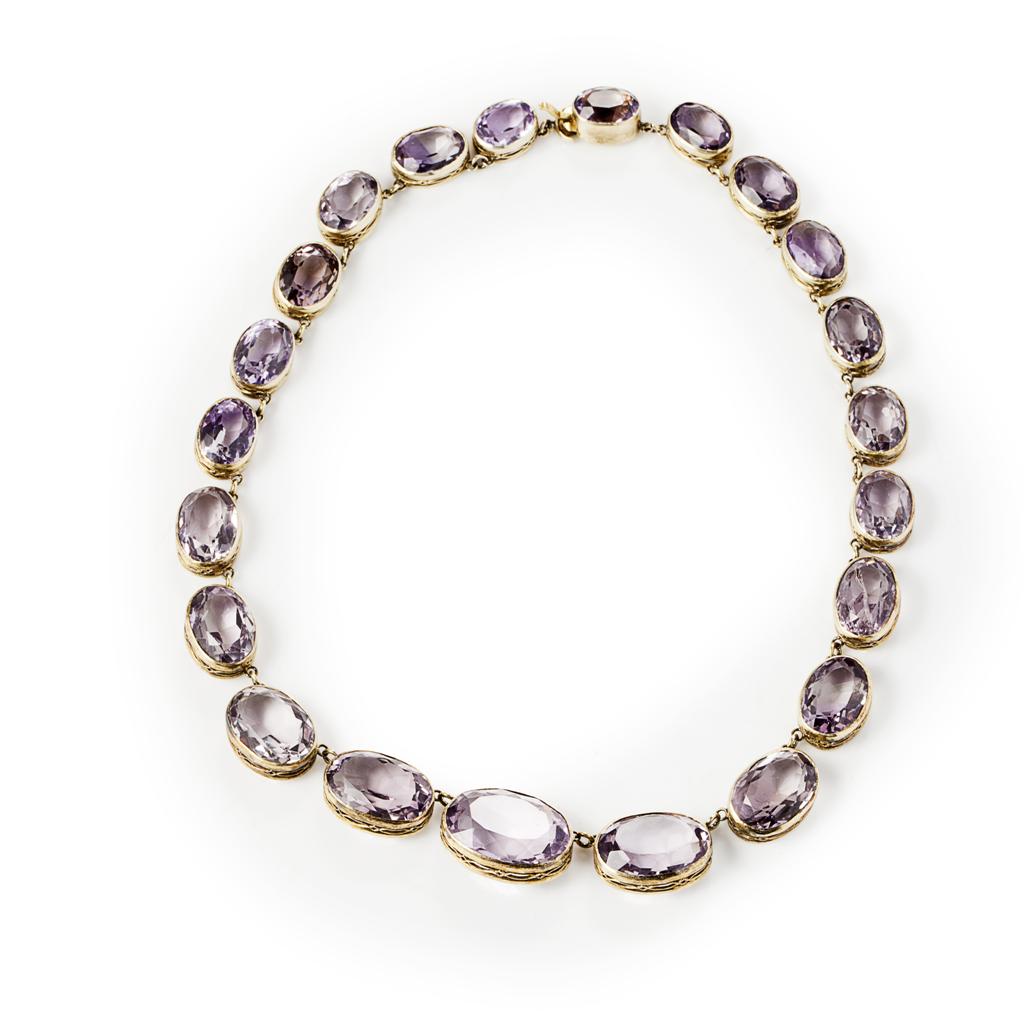 Appraisal: An amethyst riviere necklace composed of a single row of