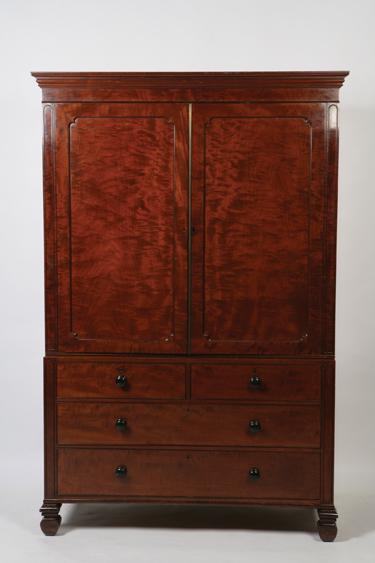 Appraisal: A REGENCY MAHOGANY LINEN PRESS the upper section with a