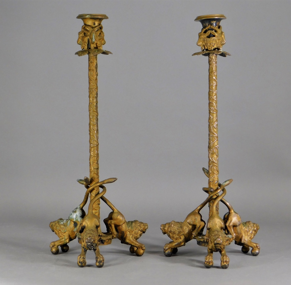 Appraisal: C CONTINENTAL GILT BRONZE LION RAM CANDLESTICKS Europe th CenturyFigural