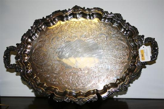 Appraisal: International silverplate serving tray Wilcox footed double handle design L