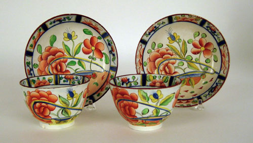 Appraisal: Two Gaudy Dutch cups and saucers th c in the