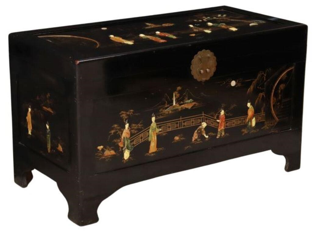 Appraisal: Chinese lacquered wood storage chest having raised figural scenes to