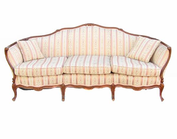 Appraisal: An Italian Rococo fruitwood upholstered sofa height in width ft