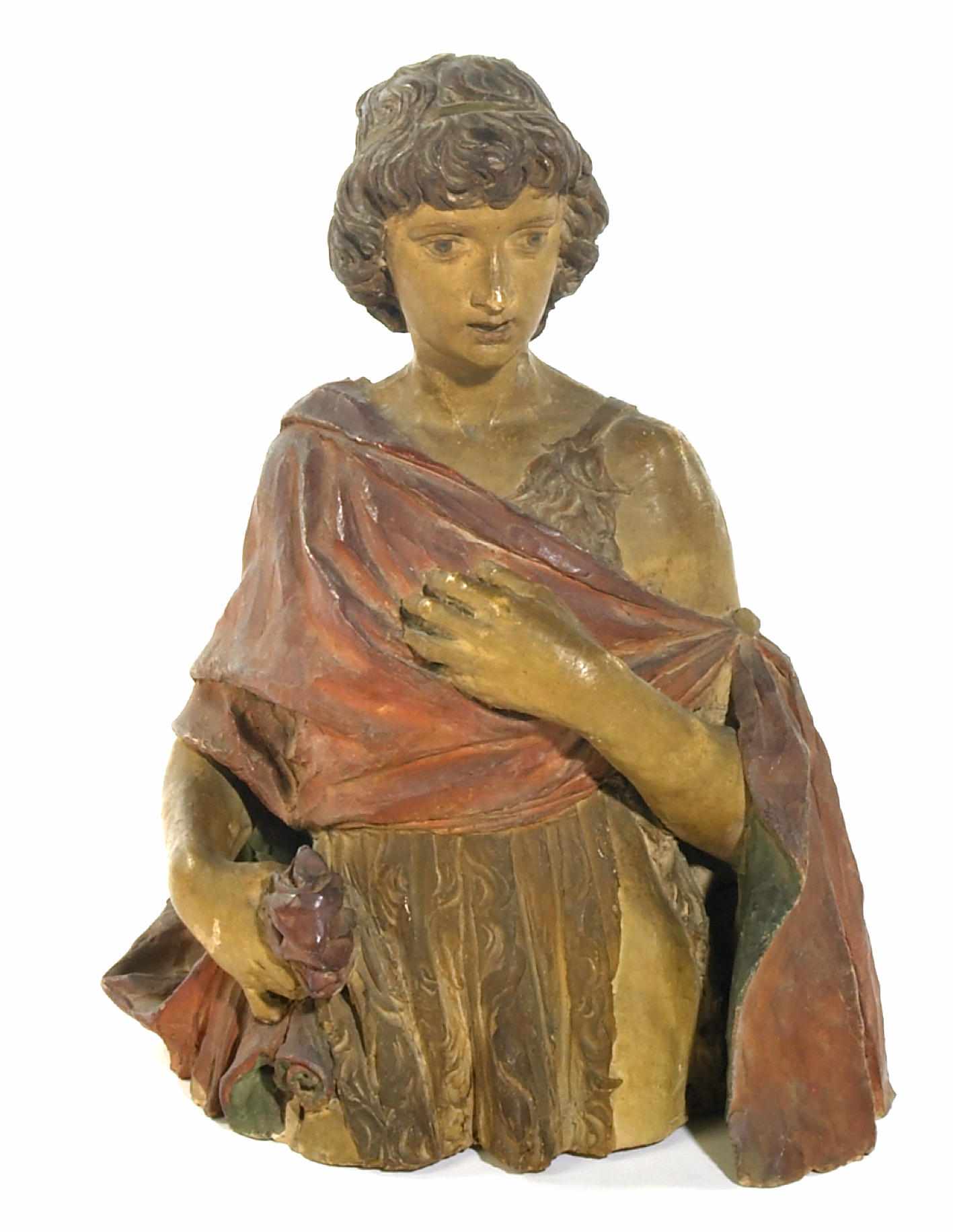 Appraisal: A painted terracotta bust of Saint John the Baptist in