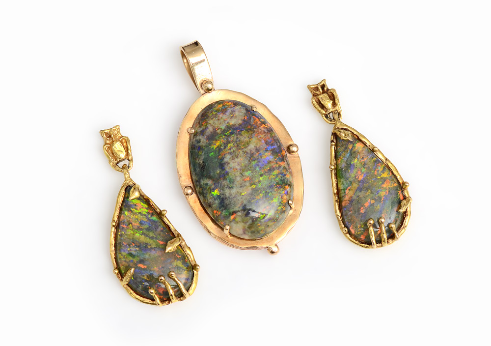 Appraisal: OPAL PENDANT EARRINGS Opals in K yellow gold settings The