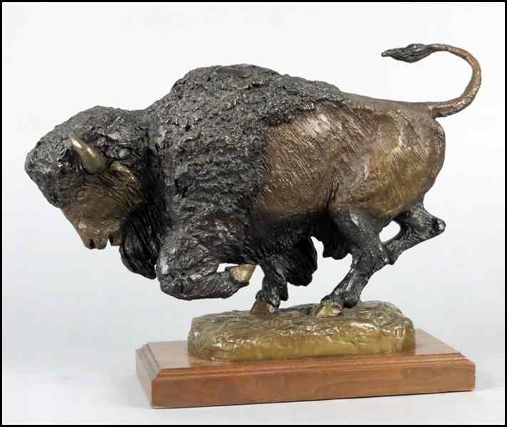 Appraisal: WALLY SHOOP AMERICAN TH CENTURY CHARGING BUFFALO Patinated bronze sculpture