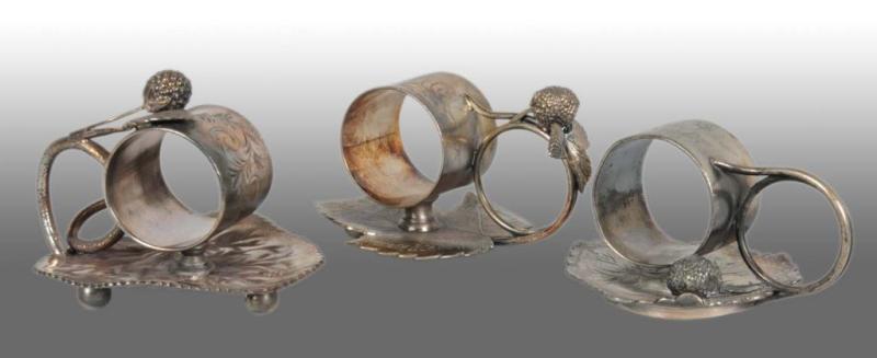 Appraisal: Lot of Figural Napkin Rings Description Includes a napkin holder