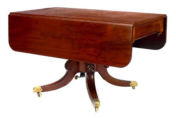 Appraisal: A late Regency style carved mahogany drop leaf table th