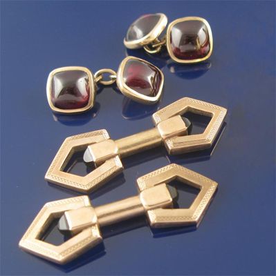 Appraisal: A pair of square cabochon garnet mounted ct gold cufflinks