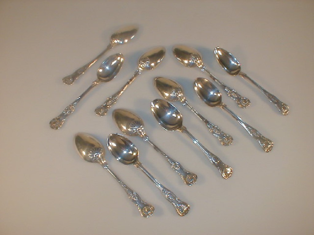 Appraisal: Eleven George IV and later silver Kings pattern dessert spoons